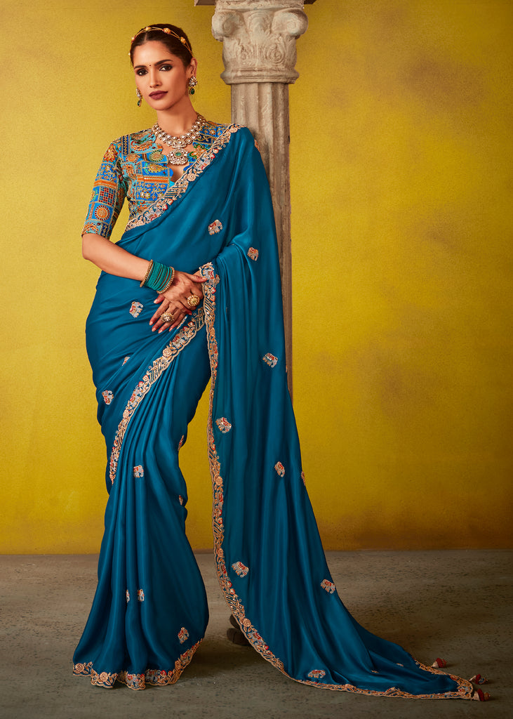 Coral Blue Woven Embroidered Chiffon Saree