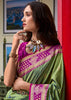 Piquant Green Woven Banarasi Silk Saree With Contrast Blouse
