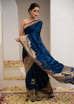 Kashi: Blue Banarasi Satin Silk Saree with Ghats of Banaras in Gold Zari