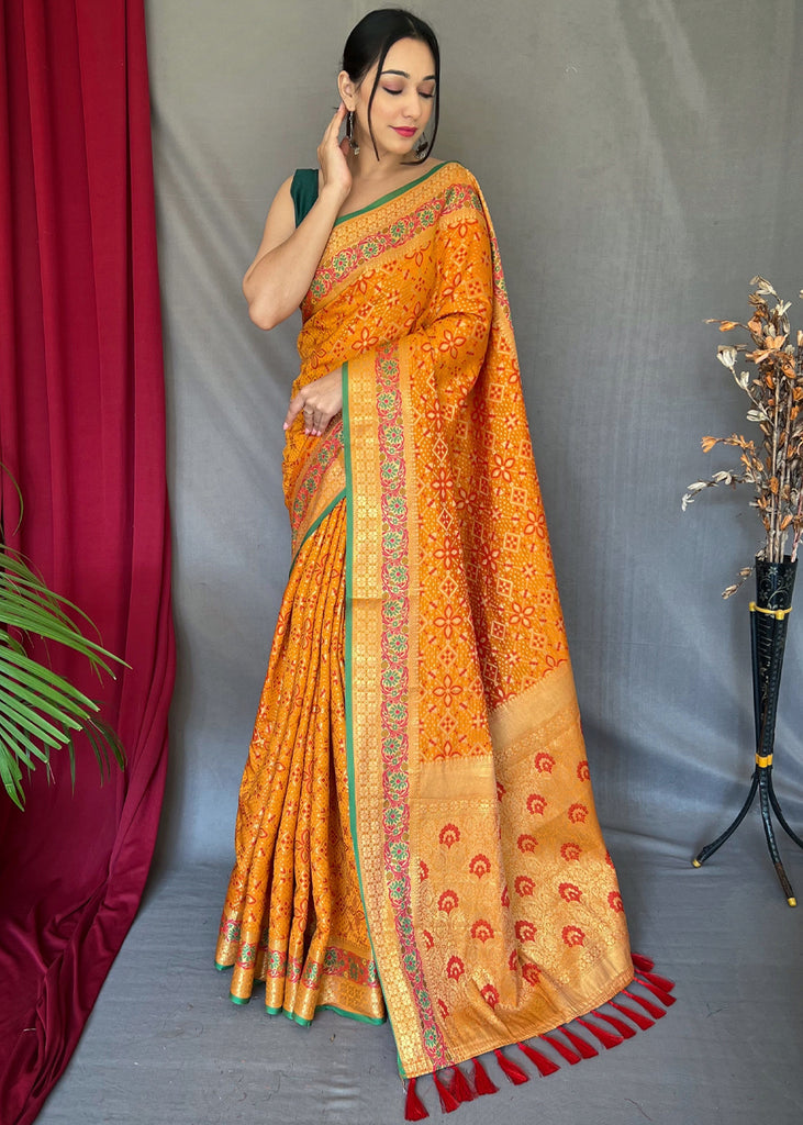 MUSTARD YELLOW WOVEN PATOLA SILK SAREE