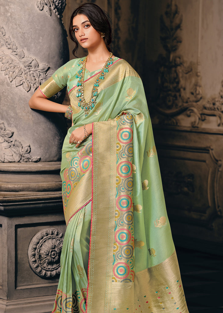 Pastel green Kora silk saree with silver & gold zari cypress tree-shaped  buttas, intricately woven border & pallu