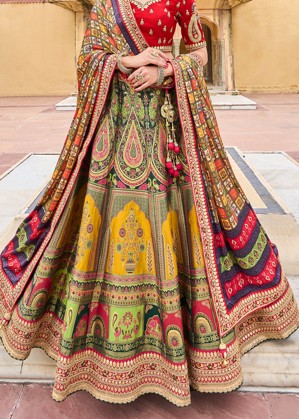 Pretty yellow lehenga with red dupatta for an engagement. See more on  wedmegood.com #wedmegood #i… | Indian wedding fashion, Indian wedding  gowns, Ceremony dresses